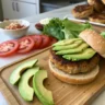 low carb avocado burger, keto avocado burger, bunless avocado burger, healthy avocado burger, avocado beef burger, lettuce wrap avocado burger recipe low carb, avocado burger, avocado turkey burger, paleo avocado burger, gluten-free avocado burger, avocado burger bowl, avocado burger ideas, low carb burger recipes